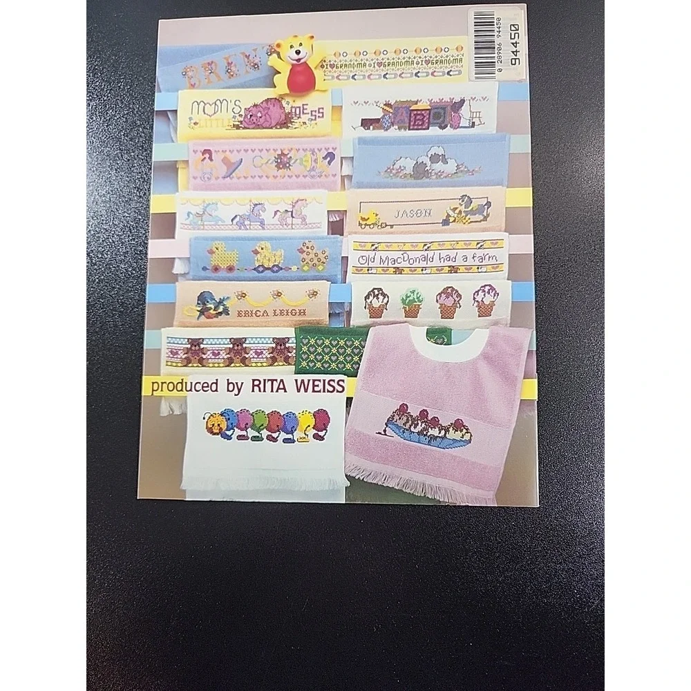 American School of Needlework Baby Bibs Cross Stitch Booklet by‎ Sam Hawkins